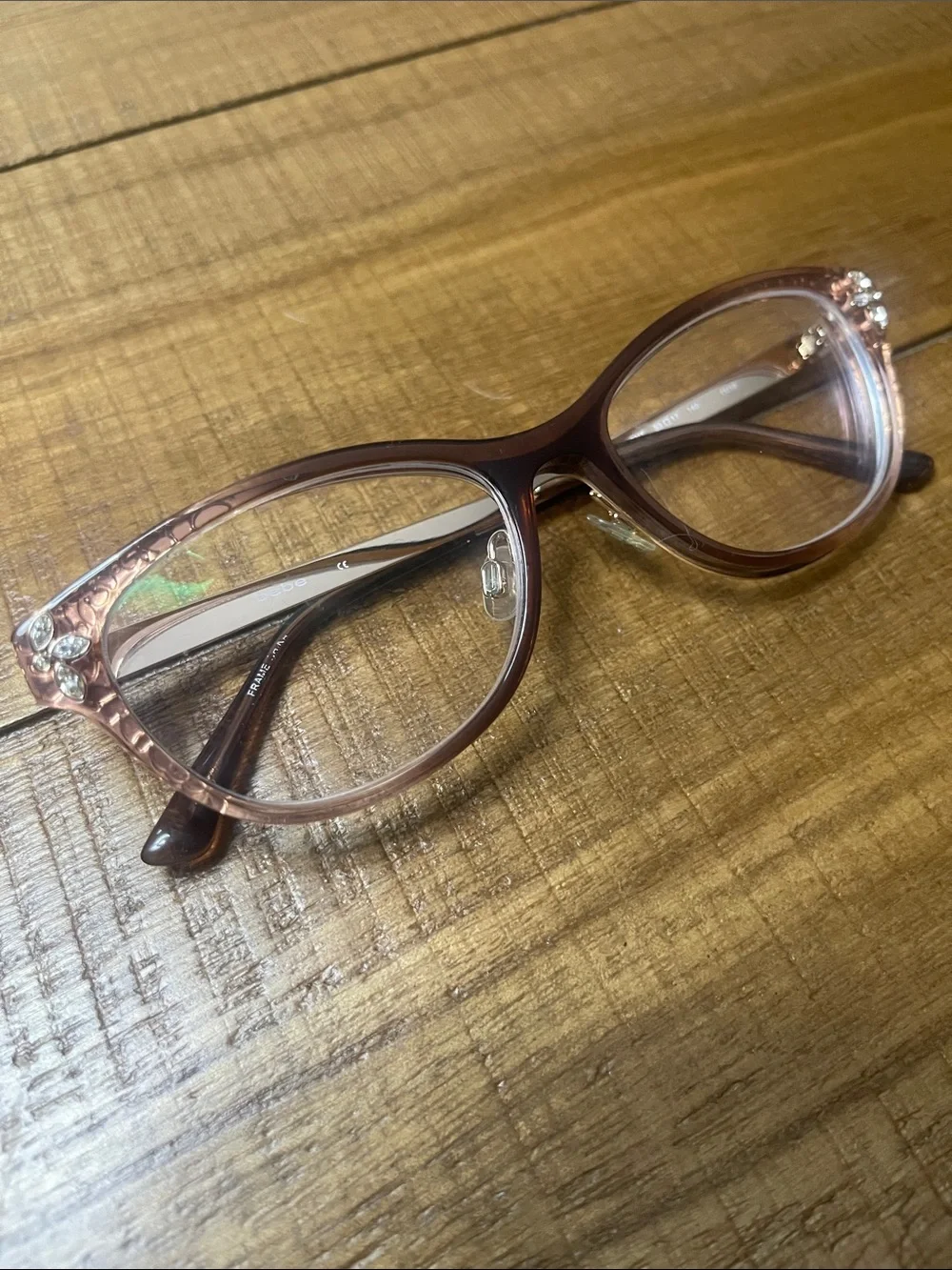 bebe Women's Transparent Brown Cat-Eye Prescription Glasses